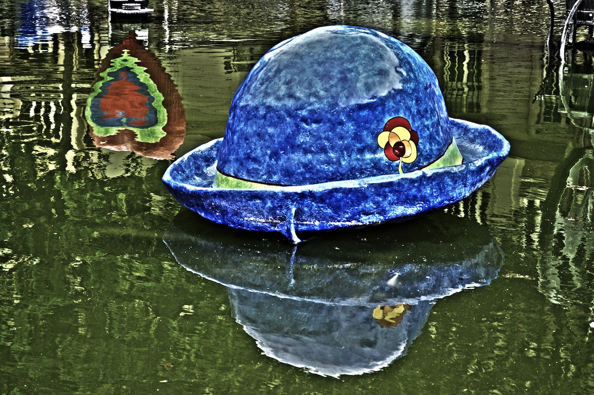 A Giant Hat And The Reflection Of A Heart