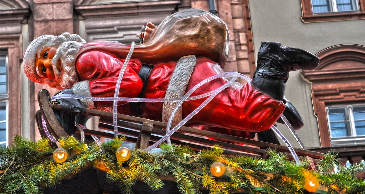 Santa Claus Tied Up With The Xmas Decoration 